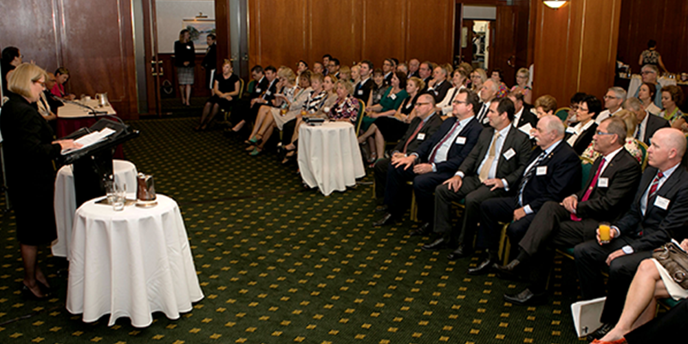 Photo of seated guests at Windsor Group's annul Sparks Around the Board Room Table